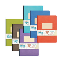 Set of six colorful notebooks with '1951' branding on a white background