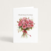 A white greeting card standing upright against a light beige background. The card features the printed phrase 'I Would Choose You Always' above a watercolor-style bouquet of pink roses with green leaves and a red ribbon.