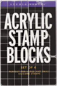 Acrylic stamp blocks packaging with text on a black background