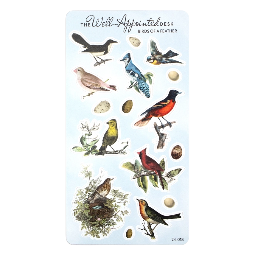 A sheet of decorative stickers from 'The Well-Appointed Desk' featuring various vintage-style bird illustrations, eggs, and branches on a pale blue background.