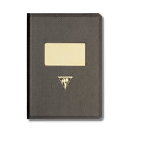 A dark brown textured hardcover notebook with a blank cream-colored label on the front and a gold-toned triangular logo, shown on a plain white background.
