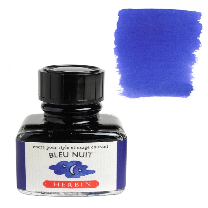 A bottle of Herbin Bleu Nuit ink with a black cap and a white label, shown next to a blue ink swatch on a white background.