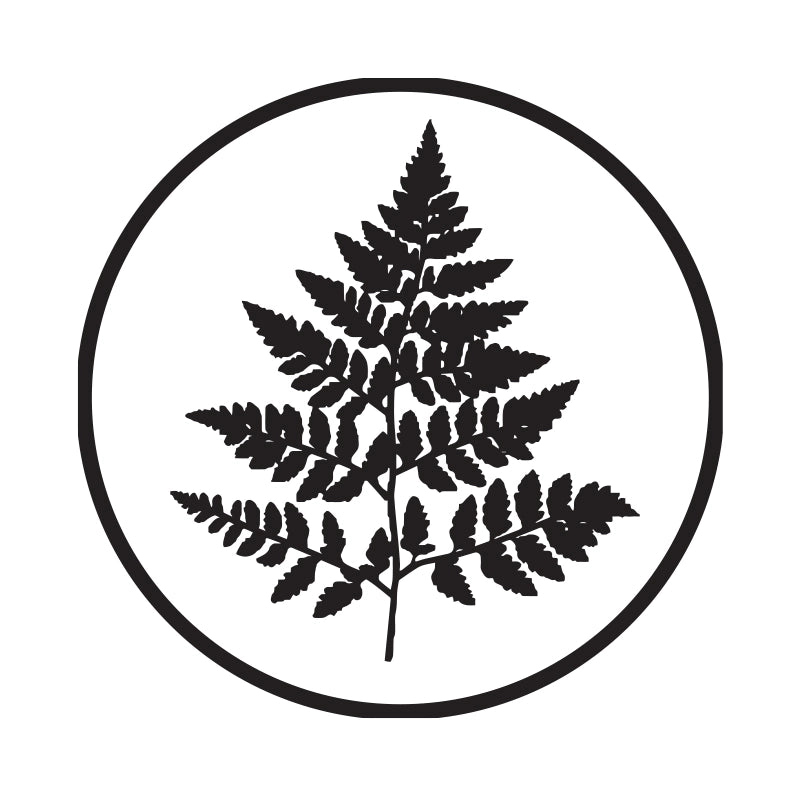 Black silhouette of a fern leaf inside a circular border on a white background
