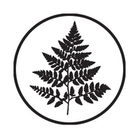 Black silhouette of a fern leaf inside a circular border on a white background