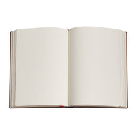 An open hardcover book with blank, warm off-white pages, shown from a top-down perspective on a solid white background.