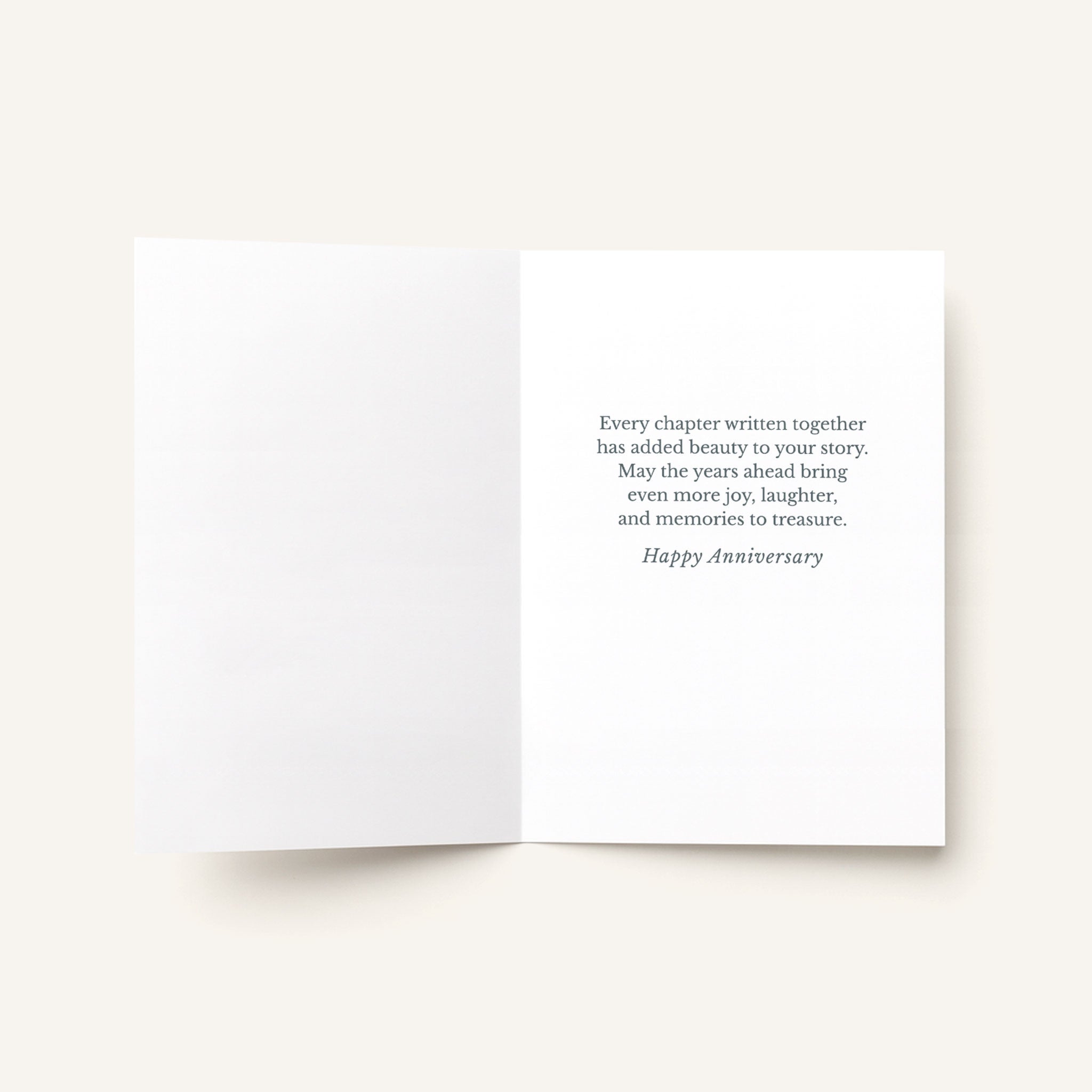 Open Celebrating Your Story card showing the printed Happy Anniversary message inside.