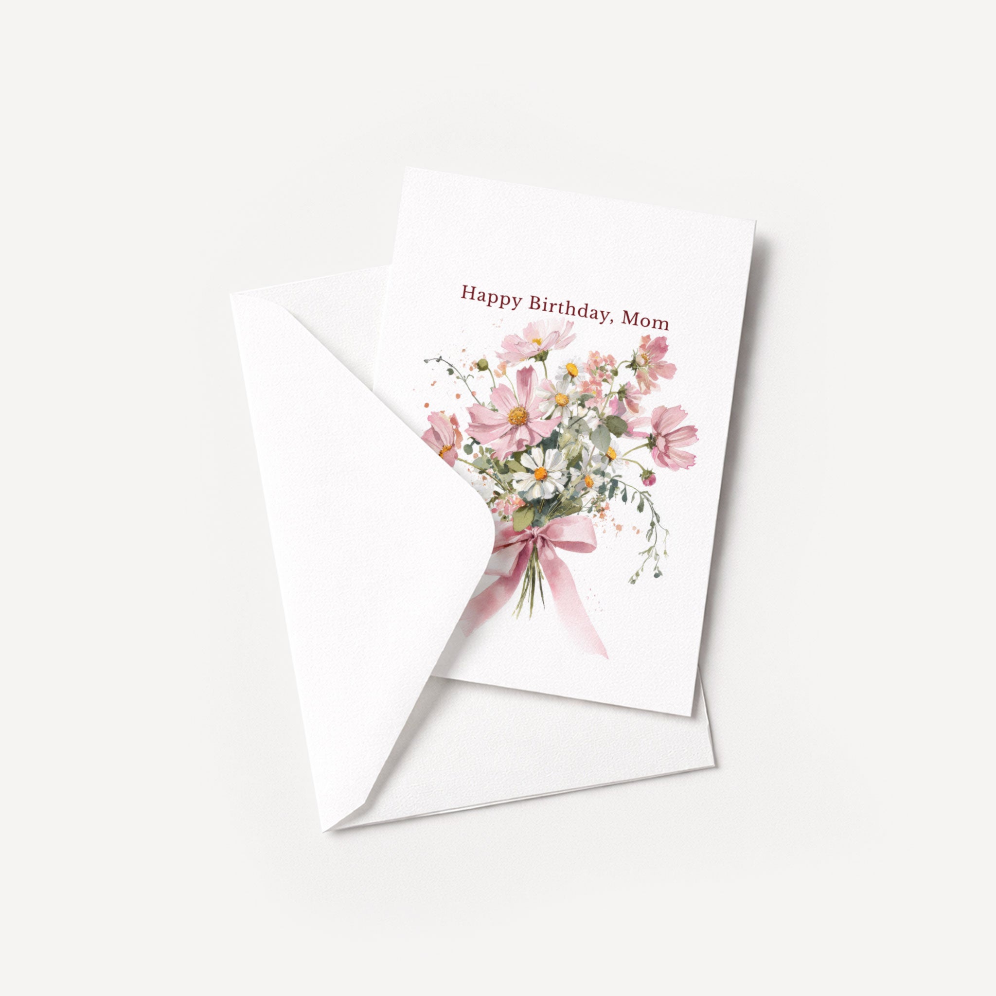 Happy Birthday, Mom floral card displayed with a coordinating white pointed-flap envelope.