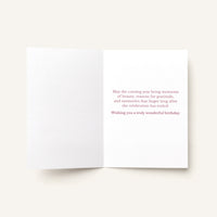 Open Happy Birthday Dear card showing the printed birthday message inside.