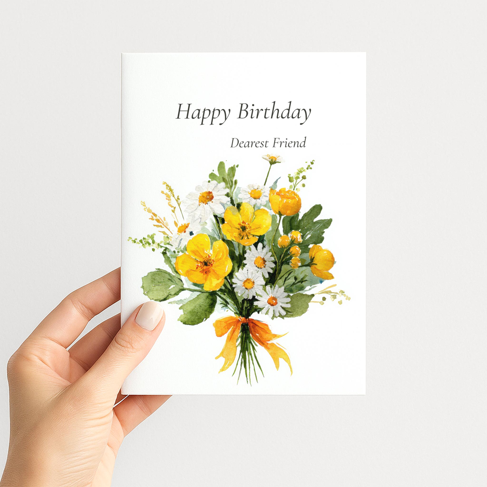 Hand holding a birthday card for a dear friend featuring bright yellow watercolor flowers and white daisies.