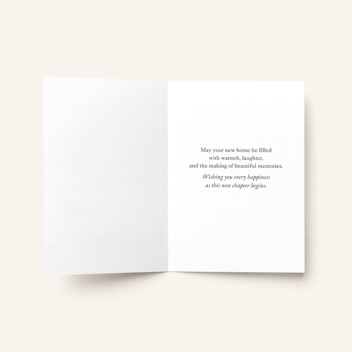 Open A Beautiful New Chapter Begins card showing the printed housewarming message inside.
