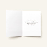 Open A Beautiful New Chapter Begins card showing the printed housewarming message inside.