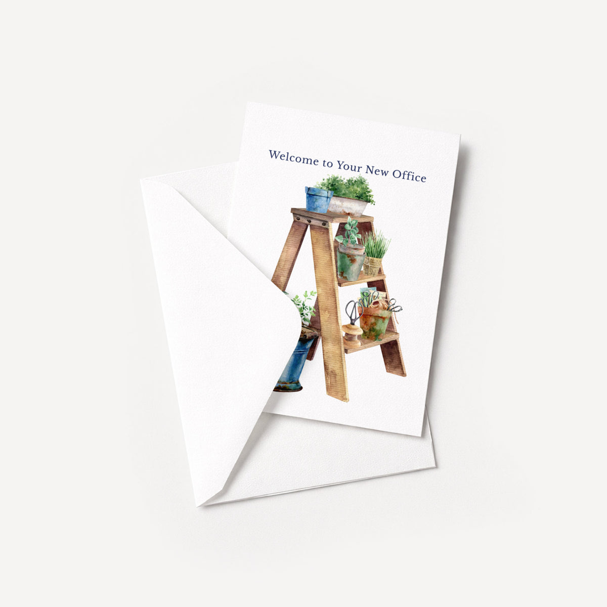 Watercolor retirement greeting card displayed with a coordinating white envelope on a neutral background.