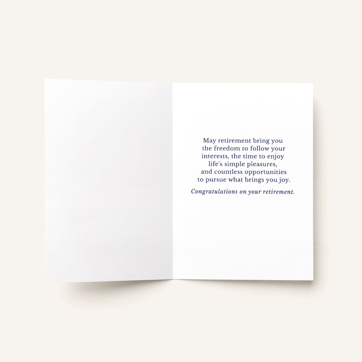Open retirement card showing the printed message, “May retirement bring you the freedom to follow your interests.”