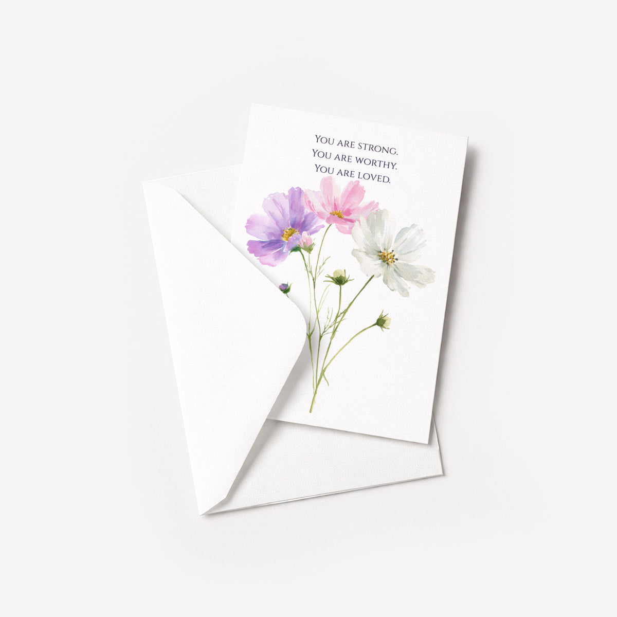 Floral encouragement card displayed with a coordinating white pointed-flap envelope.