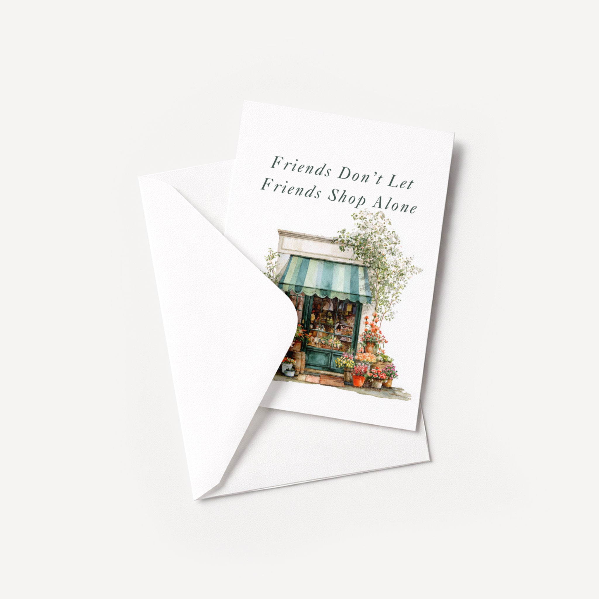 Friends Don’t Let Friends Shop Alone card displayed with a coordinating white pointed-flap envelope.