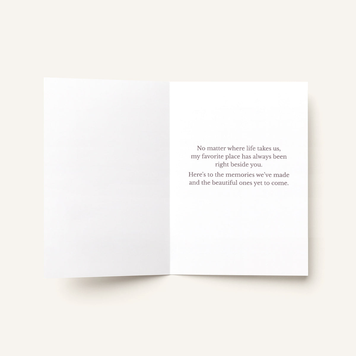 Open love card showing the message “No matter where life takes us, my favorite place has always been right beside you.”