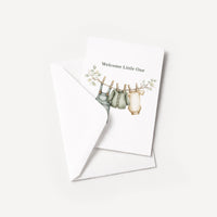 Welcome Little One baby card displayed with a coordinating white pointed-flap envelope.