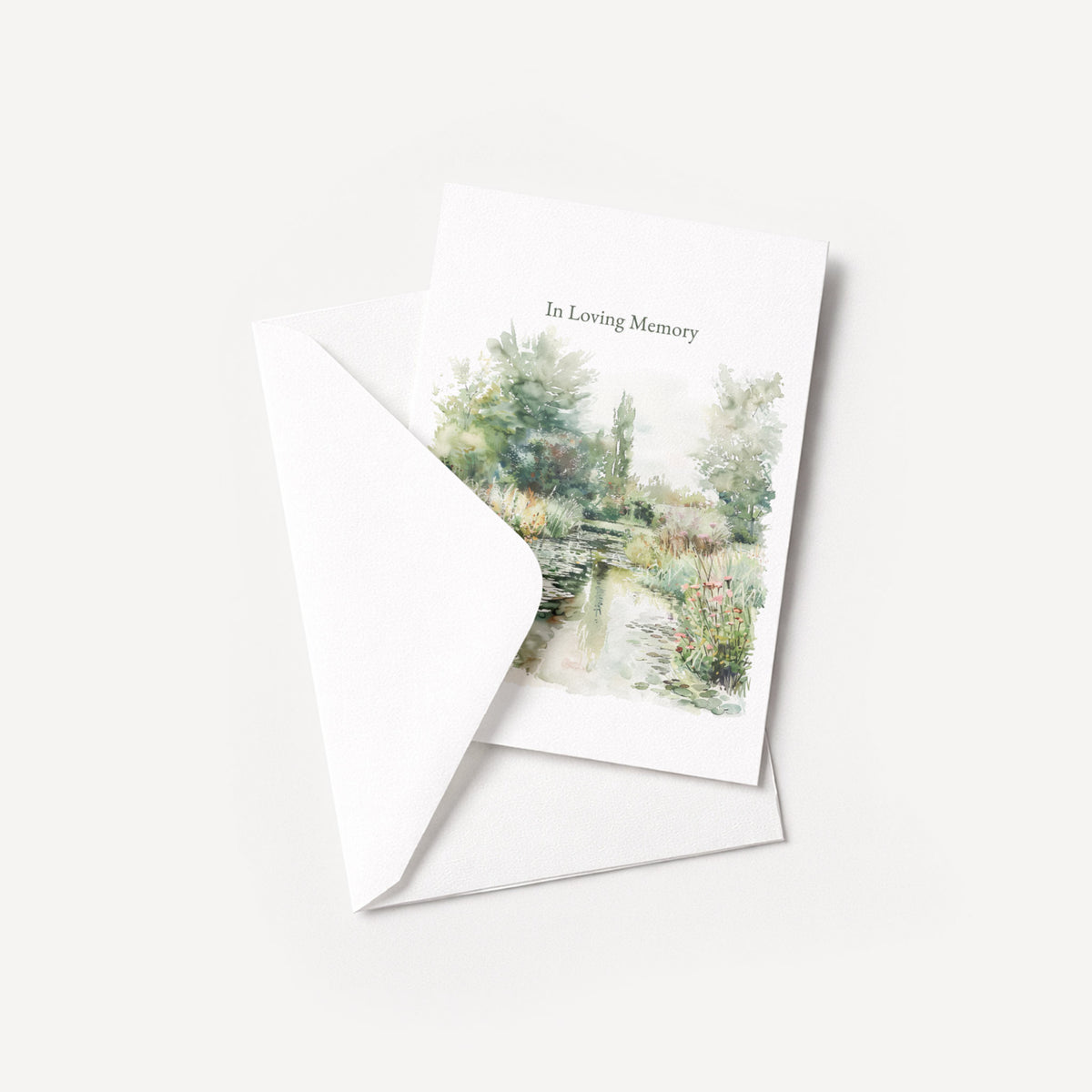 In Loving Memory sympathy card displayed with a coordinating white pointed-flap envelope.