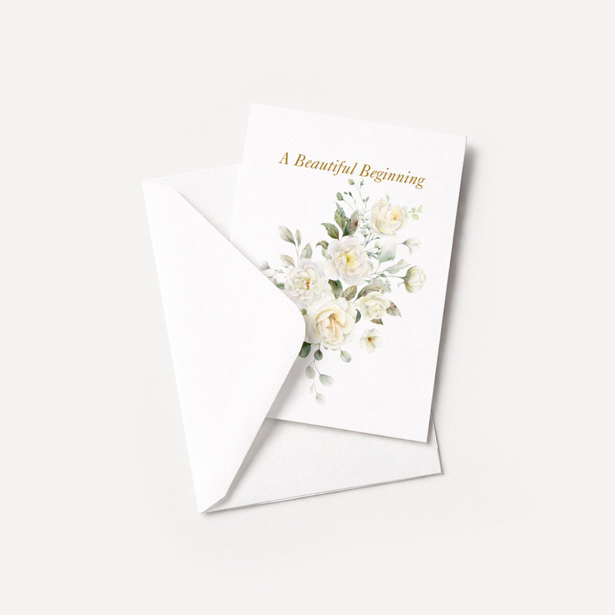 A Beautiful Beginning floral wedding card displayed with a coordinating white pointed-flap envelope.