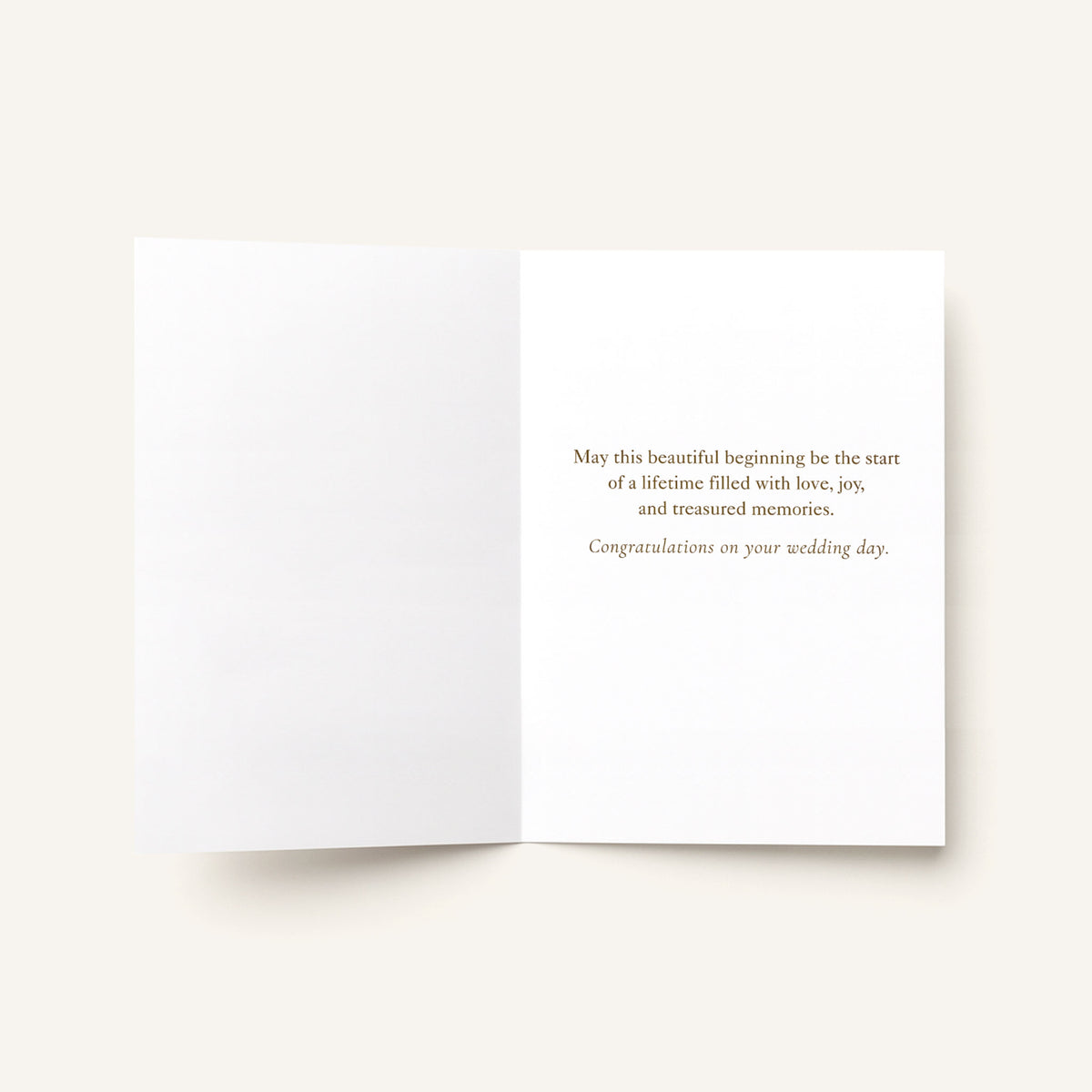 Open A Beautiful Beginning wedding card showing the printed congratulatory message inside.