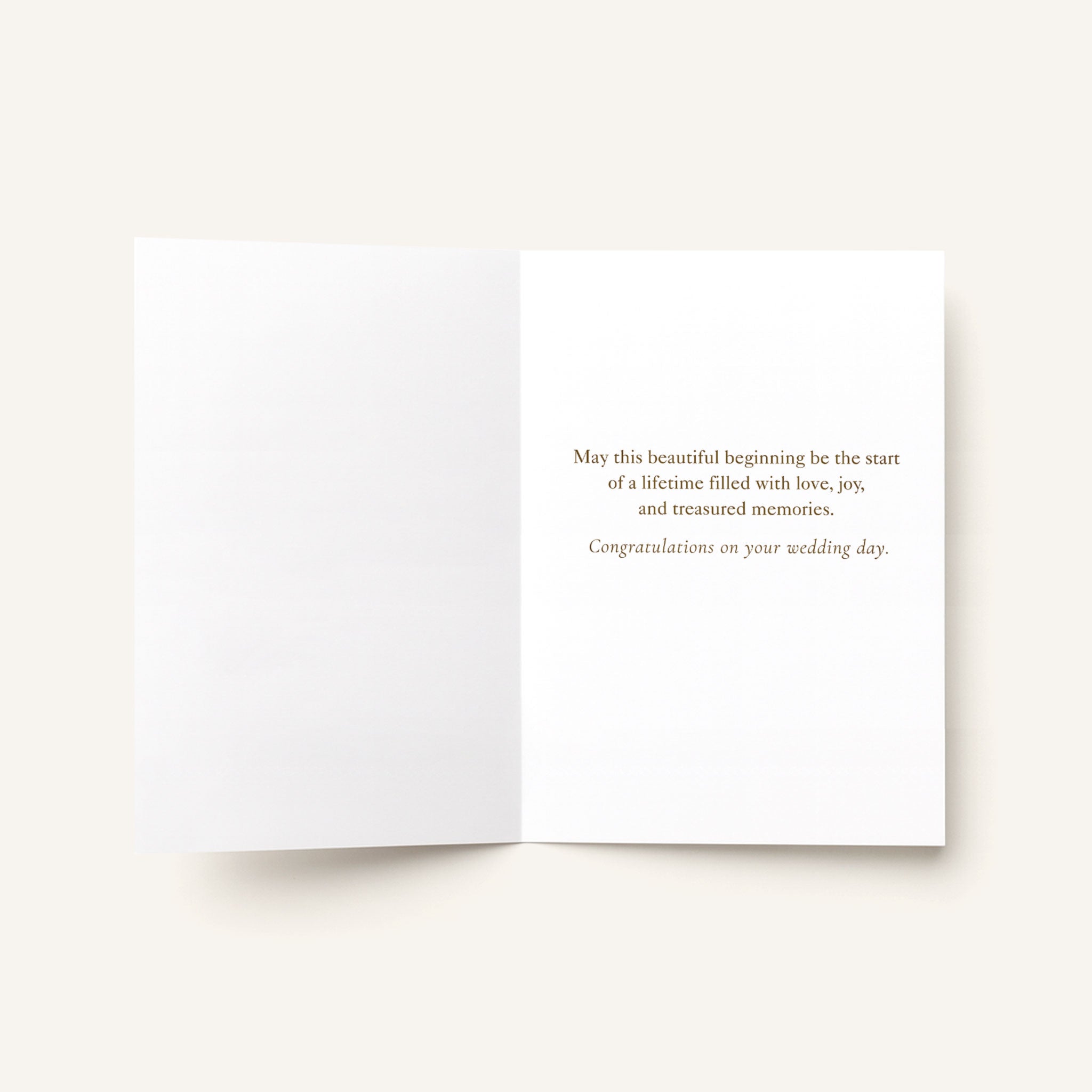 Open A Beautiful Beginning wedding card showing the printed congratulatory message inside.