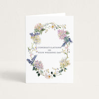 Congratulations on Your Wedding Day card featuring a delicate watercolor wreath of hydrangeas, blossoms, and greenery.