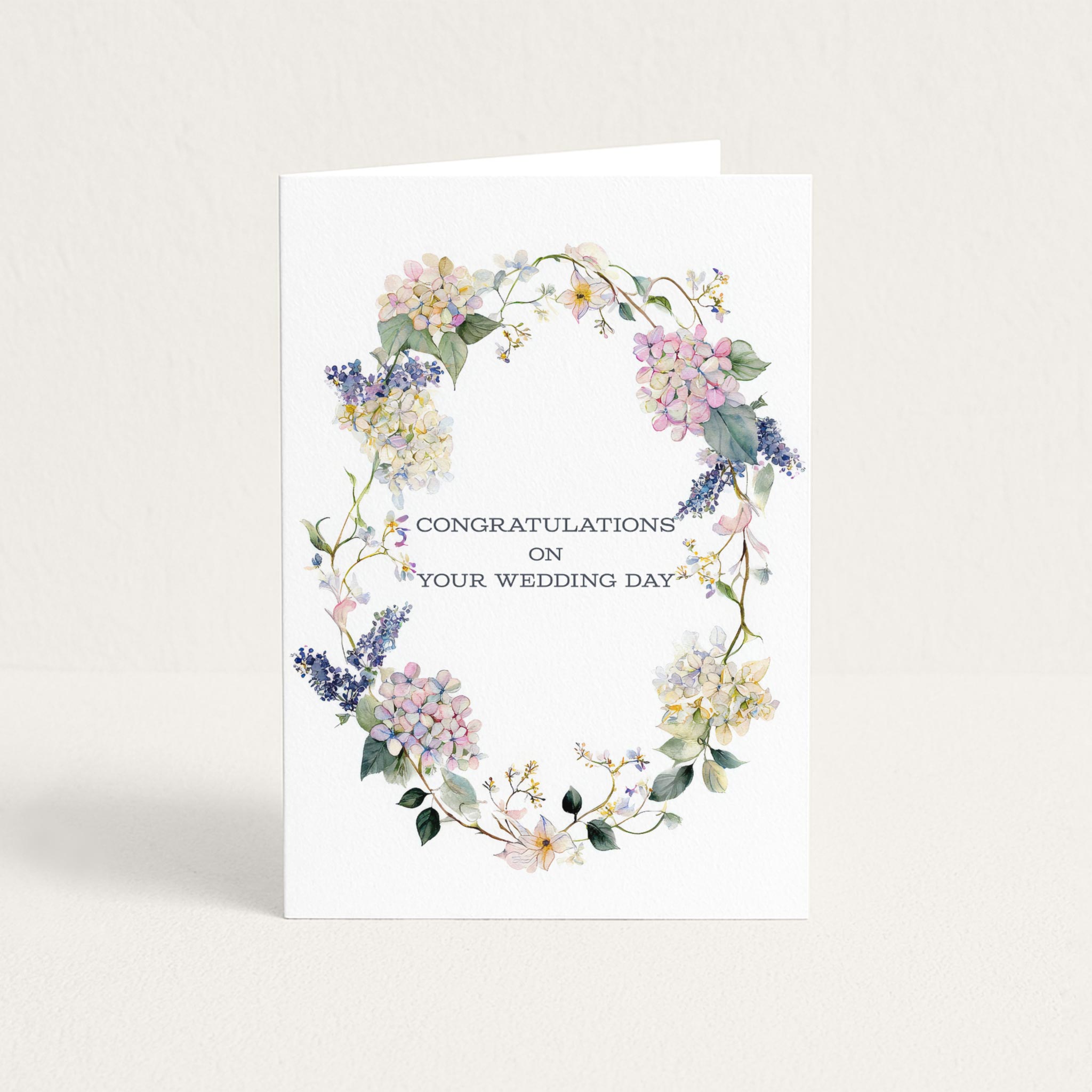 Congratulations on Your Wedding Day card featuring a delicate watercolor wreath of hydrangeas, blossoms, and greenery.