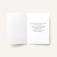 Open Congratulations on Your Wedding Day card showing the printed wedding message inside.
