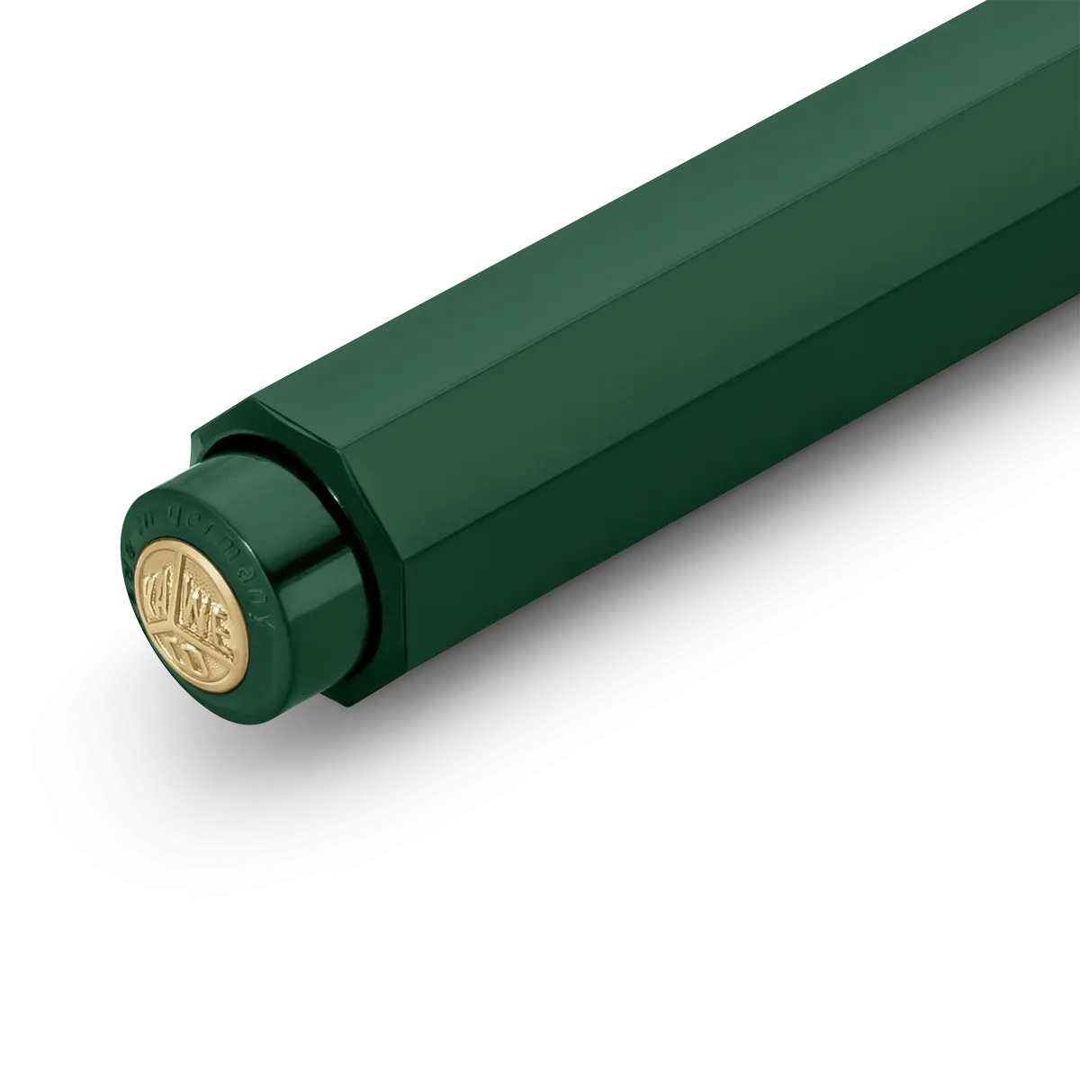 Close-up of a dark green pen with a gold-toned circular logo medallion on the cap, set against a clean white background.