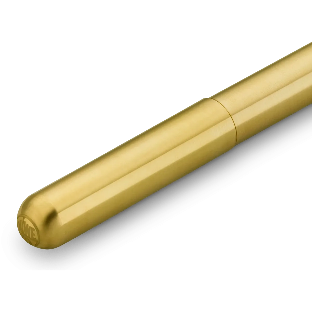 A close-up of a metallic gold pen cap with a brushed finish and a subtle embossed logo, shown diagonally on a white background.