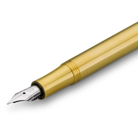 A close-up diagonal view of a gold fountain pen nib and barrel section on a clean white background.