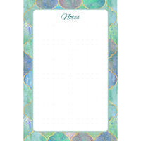 Front view of the Gilded Mosaic memo pad with a turquoise, blue, green, and violet geometric border surrounding a subtly dotted writing field.