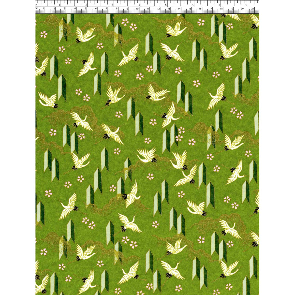 Close-up of hand silk-screen printed Chiyogami paper showing ivory cranes in flight, small blossoms, and angular motifs on green.