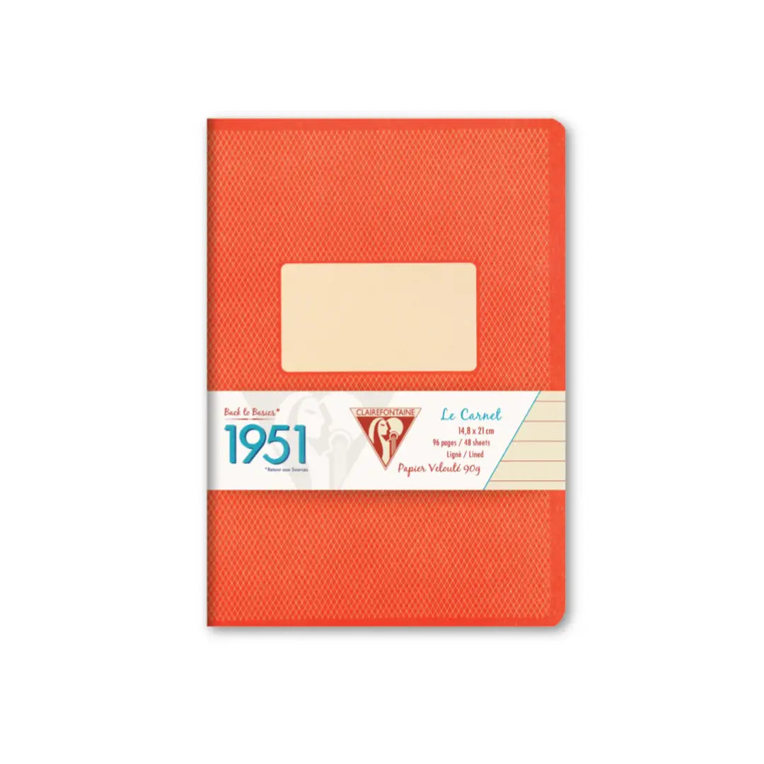 Orange notebook with a label on a white background