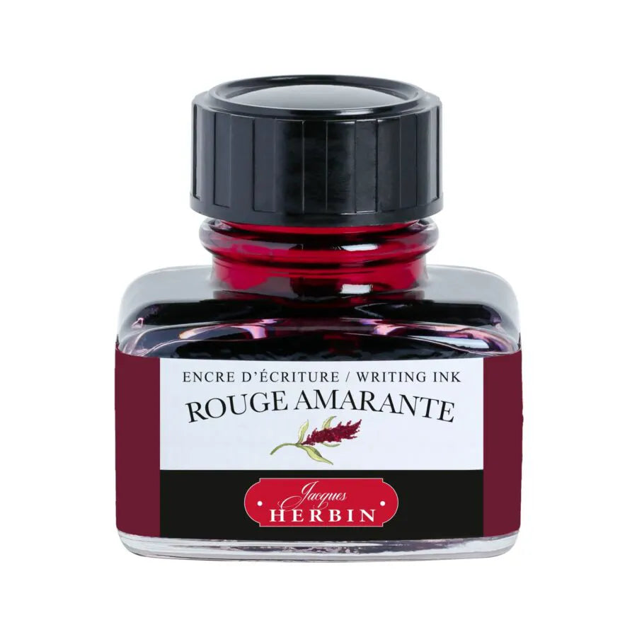 Bottle of Jacques Herbin Rouge Amarante writing ink on a white background