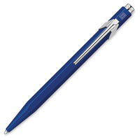 A blue retractable ballpoint pen with a silver metal clip and tip, shown diagonally on a plain white background.