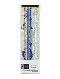 Close-up of six eraser-topped HB pencils wrapped in coordinated decorative Chiyogami paper designs.