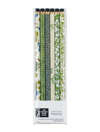 Close-up of six eraser-topped HB pencils wrapped in coordinated decorative Chiyogami paper designs.